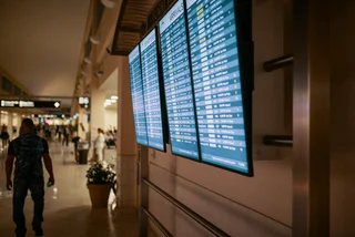 A departures board at an airport. Photo: Pexels