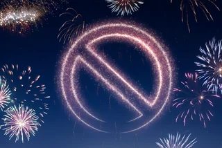 Fireworks in the shape of a forbidden symbol via iStock / eyegelb