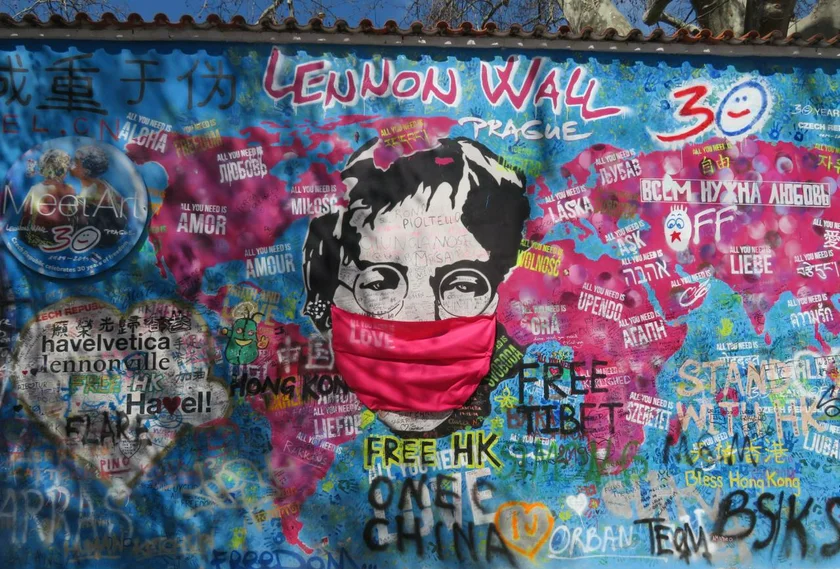 Lennon Wall in April, 2020, featuring a face mask. (photo: Raymond Johnston – Expats.cz)