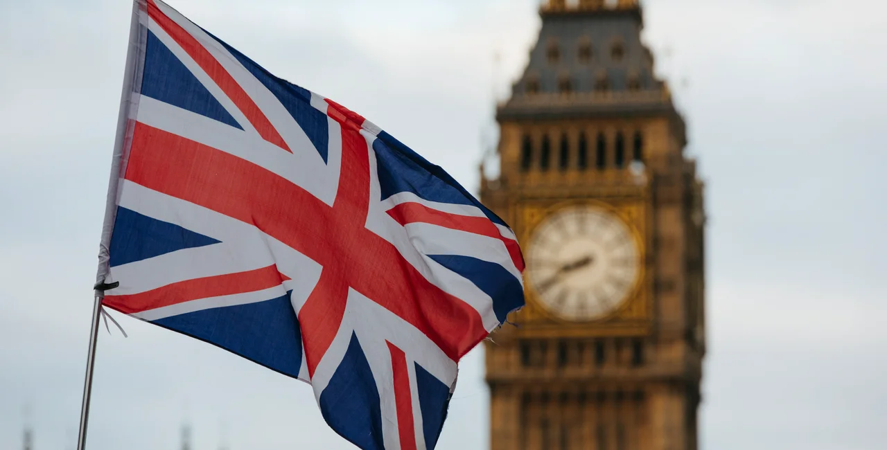 UK flag and Big Ben in London via iStock / RistoArnaudov