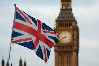 UK flag and Big Ben in London via iStock / RistoArnaudov