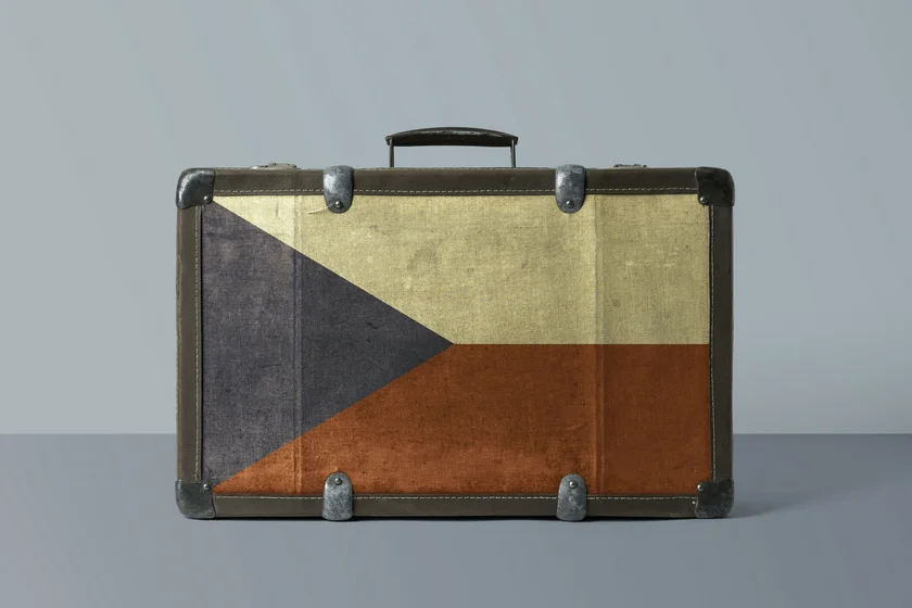 Czech Republic flag on old vintage leather suitcase (photo: iStock/sezer ozger
