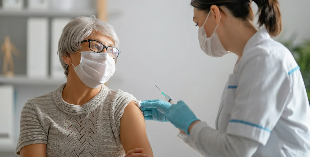 A woman getting a vaccination. (Photo: iStock, Choreograph)