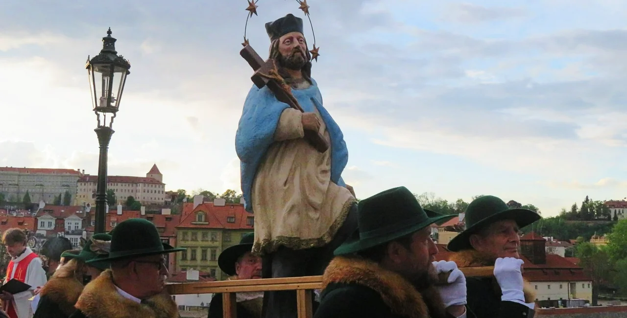 This year's Navalis celebrations were limited due to flood-like conditions and Covid restrictions (photo: Navalis processions over Charles Bridge by Raymond Johnston)