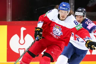 Czech defenseman Libor Šulák and UK forward Jonathan Phillips via IIHF