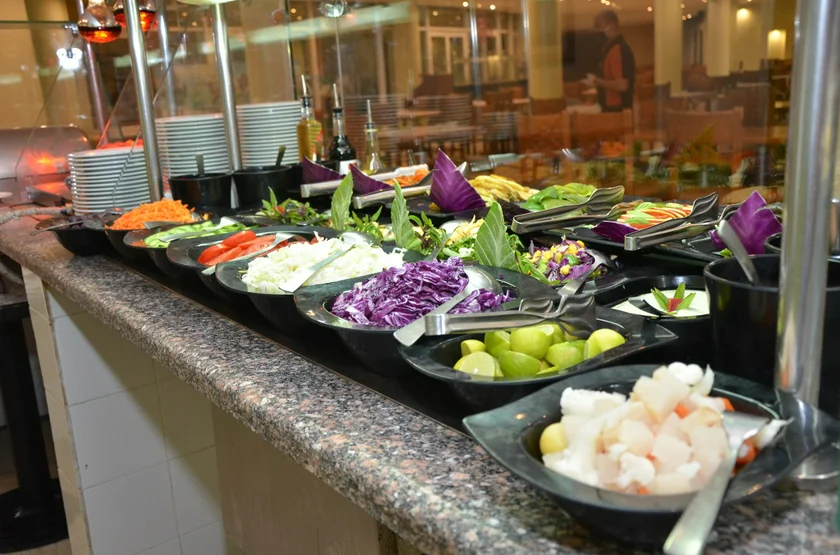 The most daunting experience was the salad bar where the chef would battle with hotel guests over which beans, tomatoes, or cucumbers they deserved (photo via Facebook/@MalikiaResort)