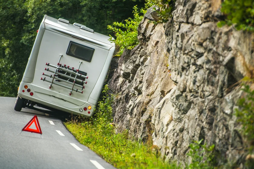 car accident vehicle insurance Creditwelcomia  iStock-1023078012 RV Camper Van Accident on the Winding Mountain Road.