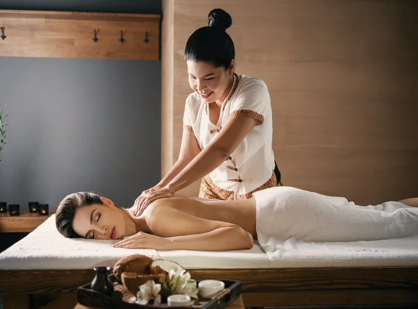 During a Thai massage, the masseuse uses not just the palms and fingers during the massage, but also the forearms, elbows, and knees.