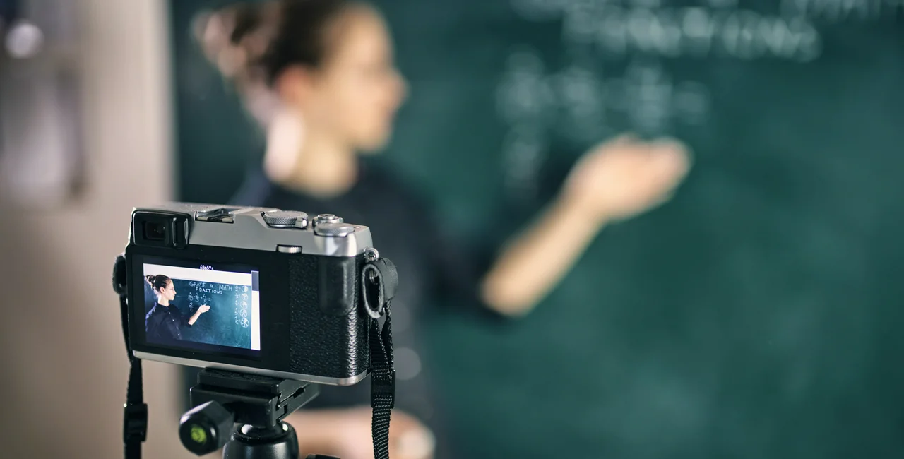 A teacher films a class for distance learning. (Photo: iStock, Imgorthand)