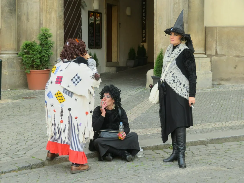Three witches preparing for the parade at Malostranské náměstí in 2019. Photo: Raymond Johnston