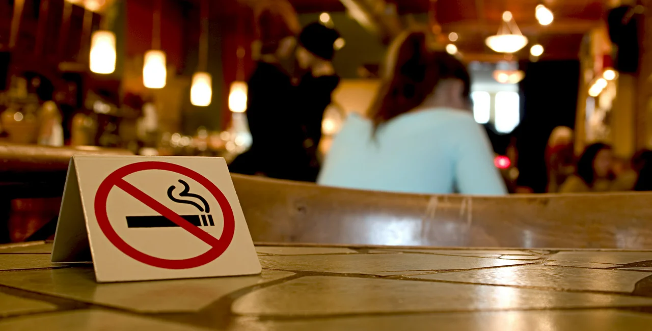 Non-smoking sign in a restaurant. Photo: iStock / philpell