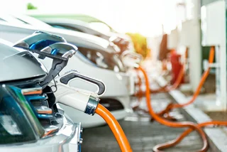 Electric cars charging in a station. Photo: iStock / baona
