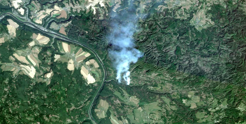 The fire in Czech Switzlerand is visible from outerspace. Photo: Fire in Czech Switzerland visible from space in an image taken by the PlanetScope satellite on July 25, 2022.
