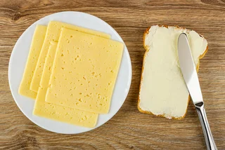 Cheese, bread, and butter. Photo: iStock, EugeneTomeev.