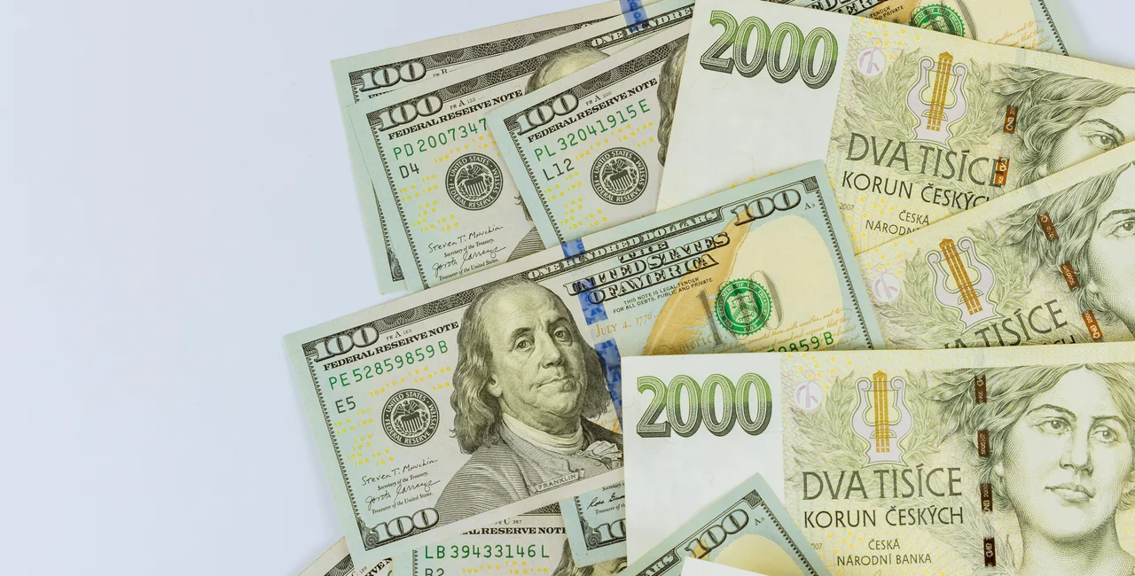 Czech and US currency / iStock photovs