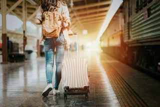 Traveling to the airport by train. Photo: iStock / interstid