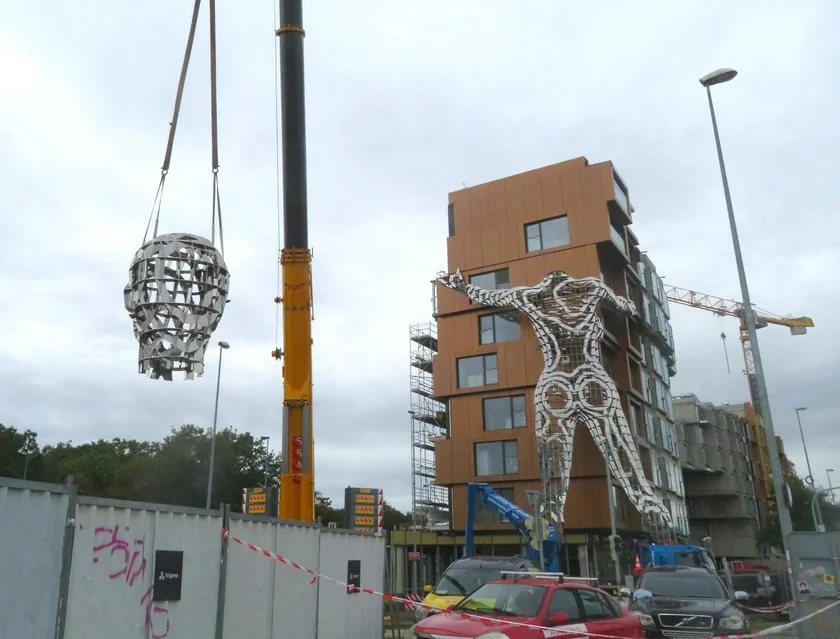 The head is moved into place by a crane. Photo: Raymond Johnston.