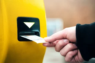 Paying transport fare in Prague. iStock / borchee