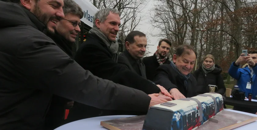 The Prague Mayor and his deputy among others cutting the celebratory cake. Photo: Raymond Johnston