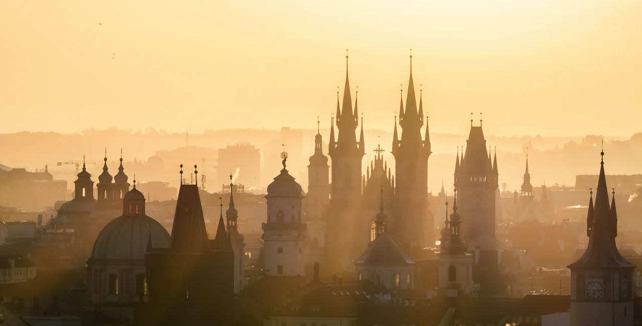 Prague spire at sunrise / Denis Poltoradnev for Unsplash