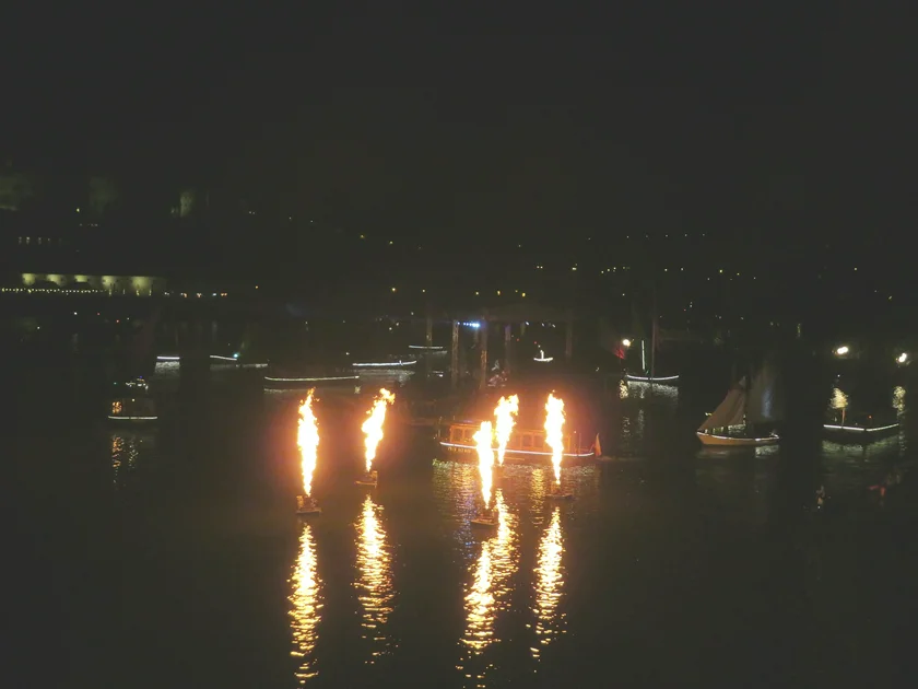 Boats and jest of fire. Photo: Raymond Johnston