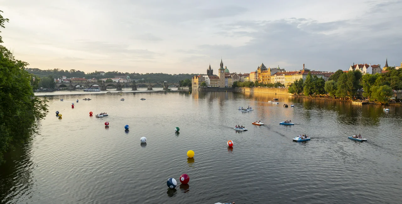 Inflatable giant billiard balls appear on Prague's Vltava