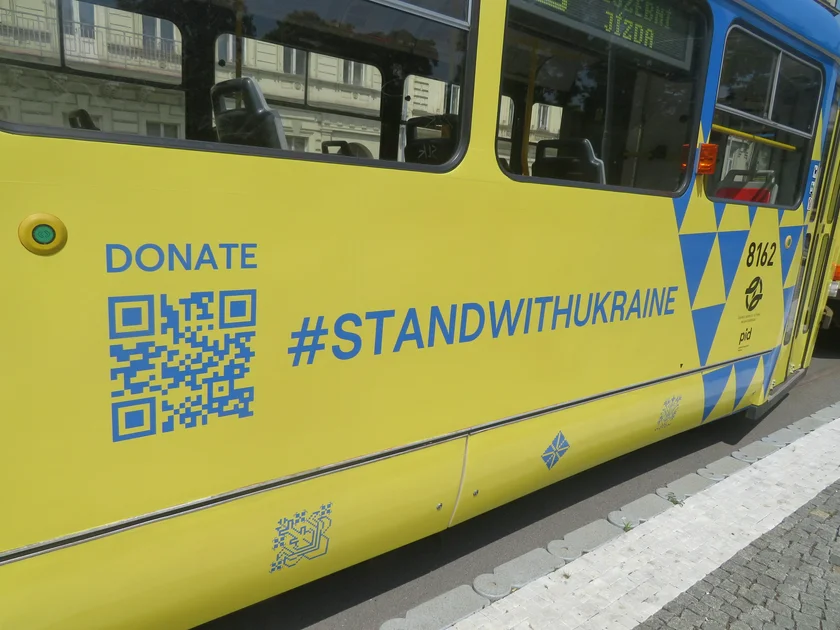 QR code for donating on the side of the tram. Photo: Raymond Johnston