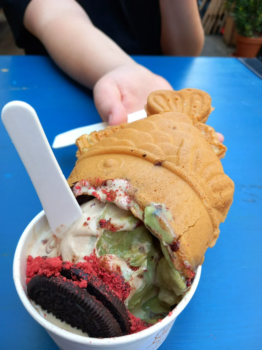 Sunyaki with red bean paste, brown sugar and milk tea-matcha soft serve, dried strawberries, and Oreos.