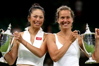 Barbora Strýcová (right) holding her 2023 Wimbledon trophy. Photo via Twitter/@WTA.