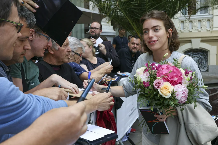 Actress Clara McGregor receives a bouquet. Photo: KVIFF