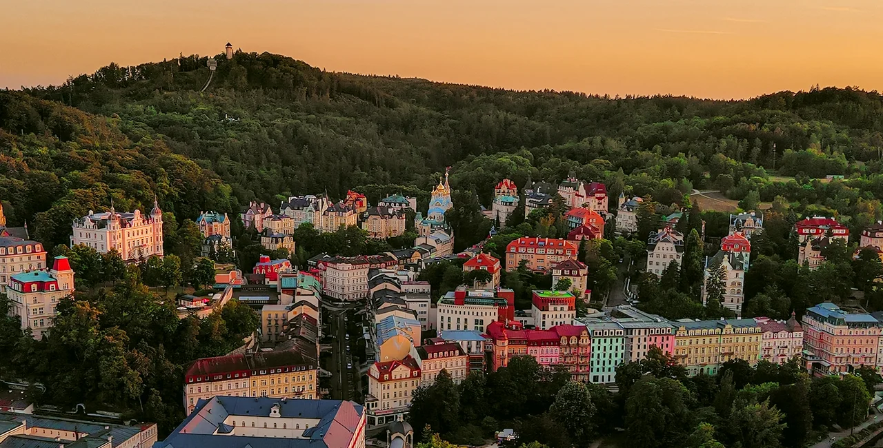 Photo via iStock by aluxum, Karlovy Vary SPA town view
