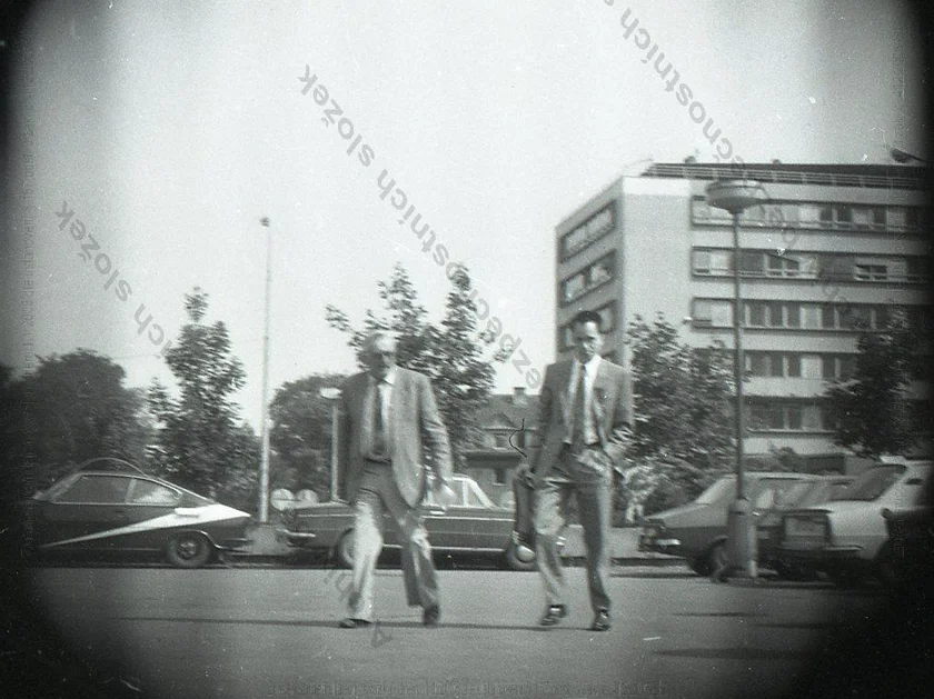 Baker with his associate, Arnold, covertly pictured in Prague's
