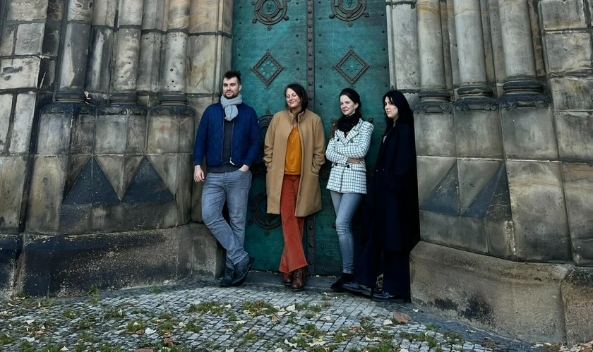 From l-r: Thomas our news editor, me, former content manager Ioana, and designer Daria in Karlín.