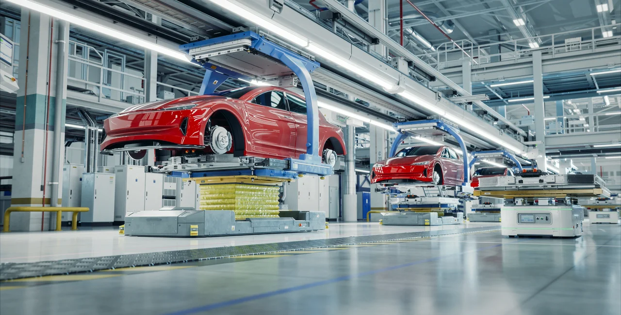 Vehicles on an automated assembly line. Photo: Shutterstock / IM Imagery