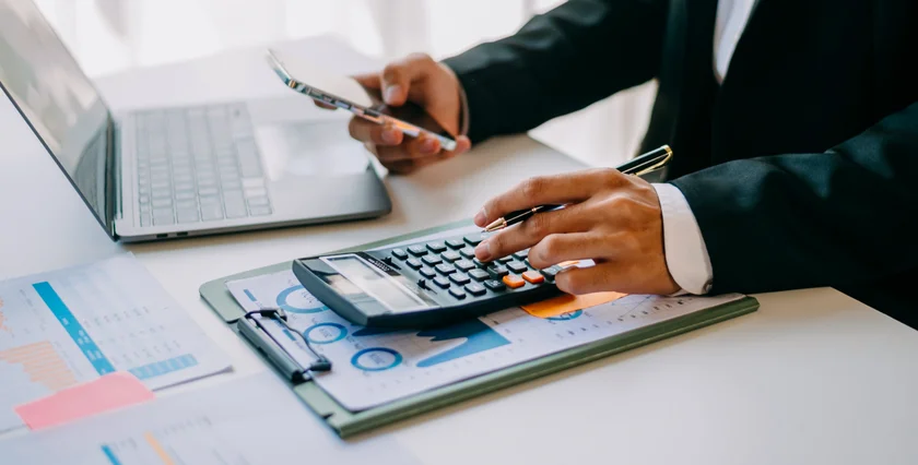 Feb2025 Taxes Guide tax taxes calc accountant Photo_Taxes Shutterstock by Nuttapong punna