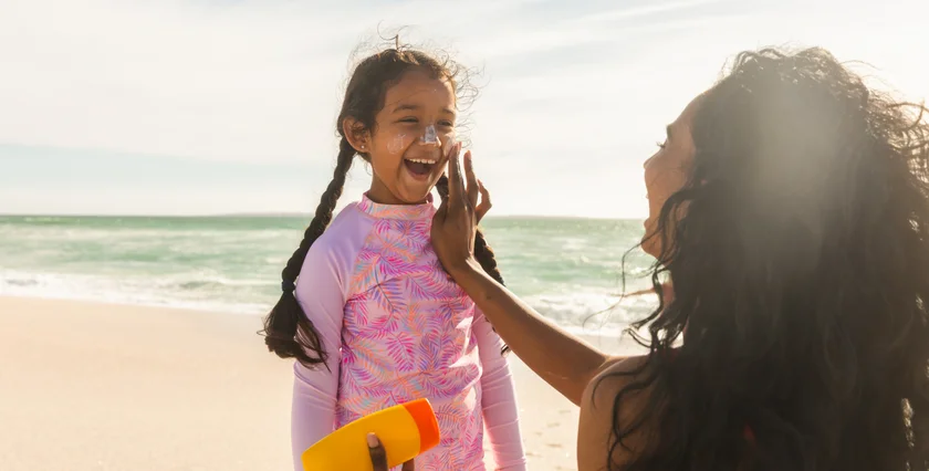 Shutterstock by wavebreakmedia   family beach child sun sunscreen