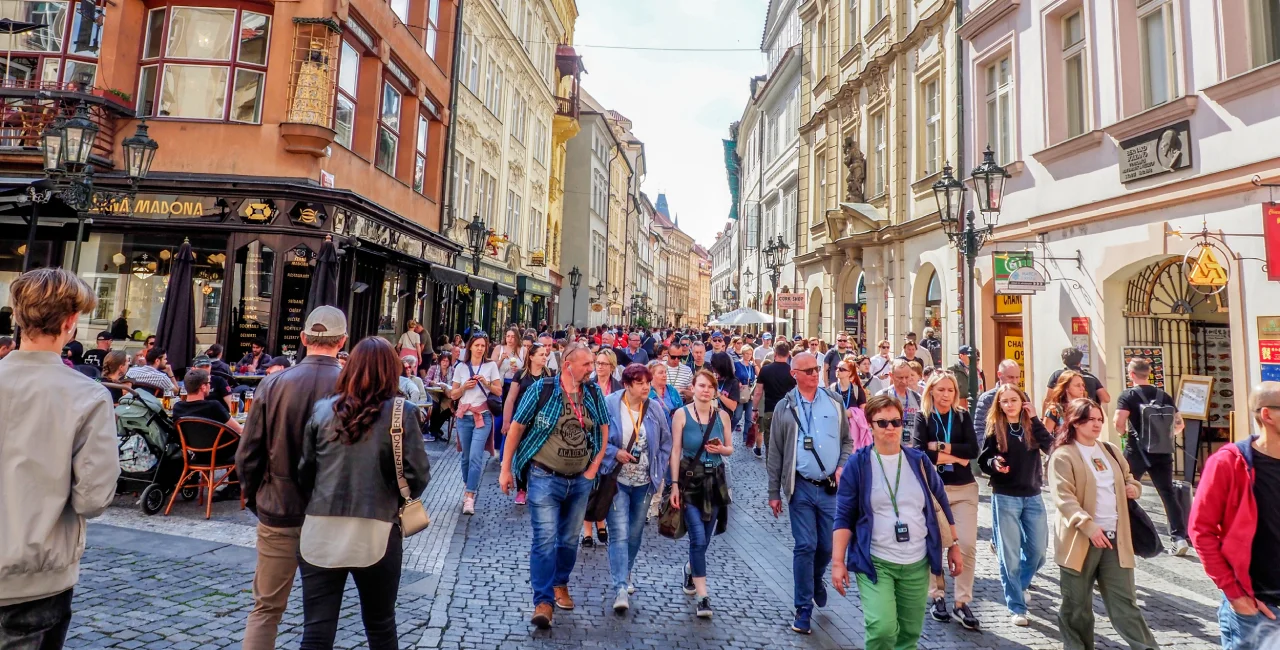 Crowd of people in Prague. Photo: Shutterstock / IgorGolovniov