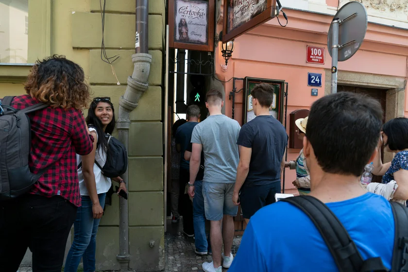 Tourists mill around the entrance to the passage in 2019. Photo: Shutterstock/Andrea Izzotti