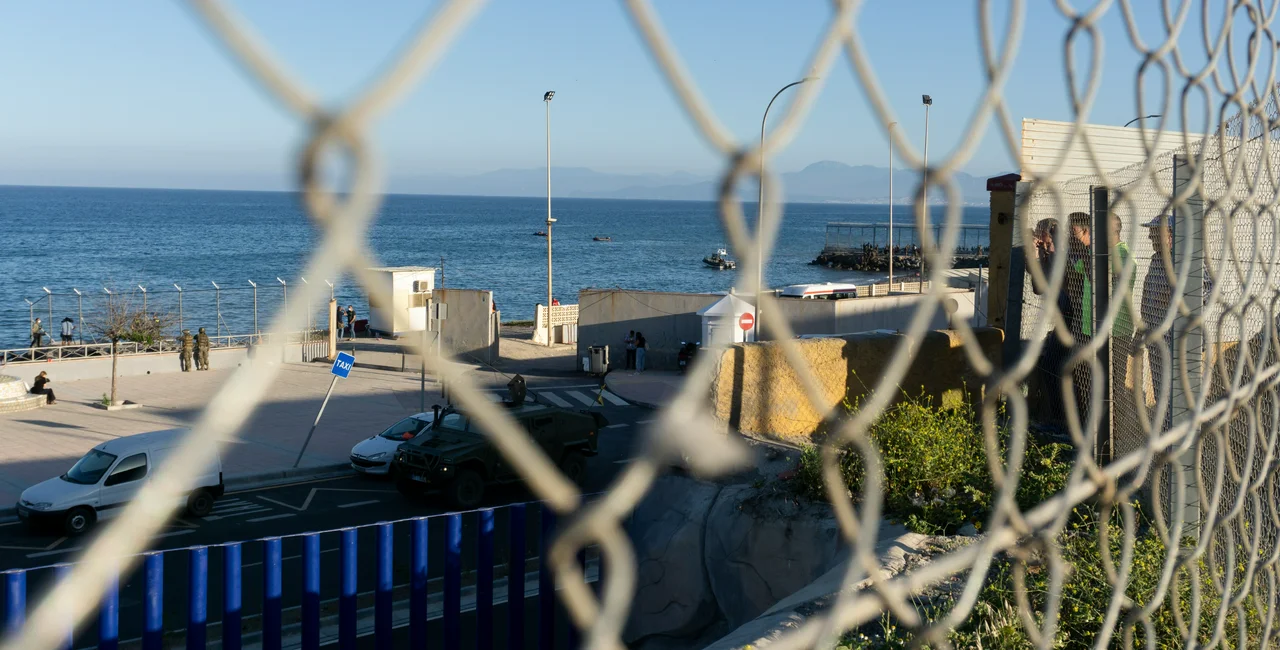 Ceuta, Spain; May 18 2021: Massive entry of moroccan immigrants on the Ceuta border, with military presence. Shutterstock/