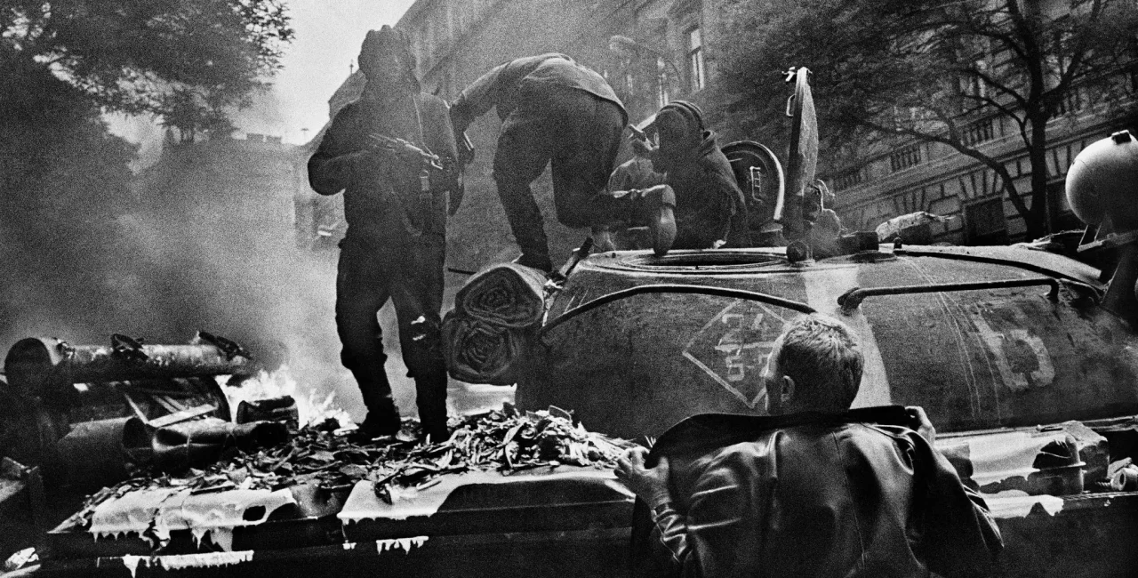 Soldiers abandoning a burning tank in Prague. Credit: Josef Koudelka/Magnum Photos
