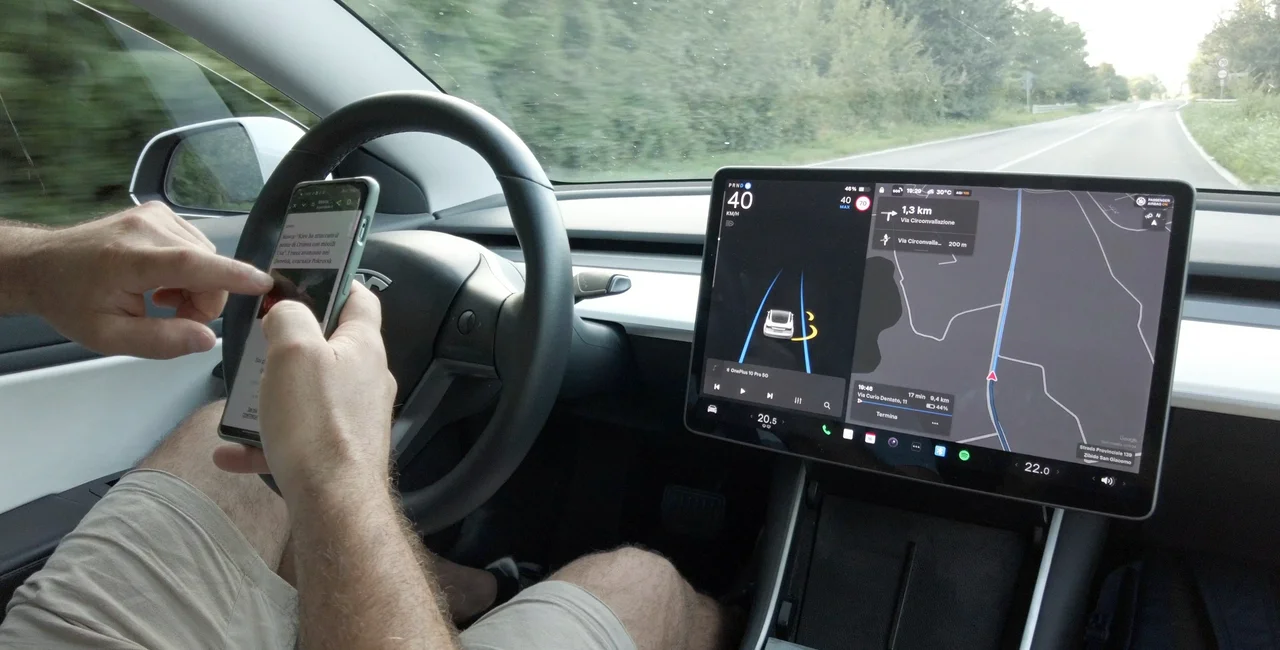 Self-driving Tesla near Milan, Italy. Photo: DELBO ANDREA / Shutterstock.com