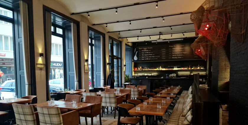 The main restaurant seats up to 50 guests. For larger groups, the back lounge is also available, with the buffet served there.