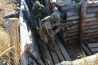 Czech troops practice trench warfare during NATO deployment in Slovakia