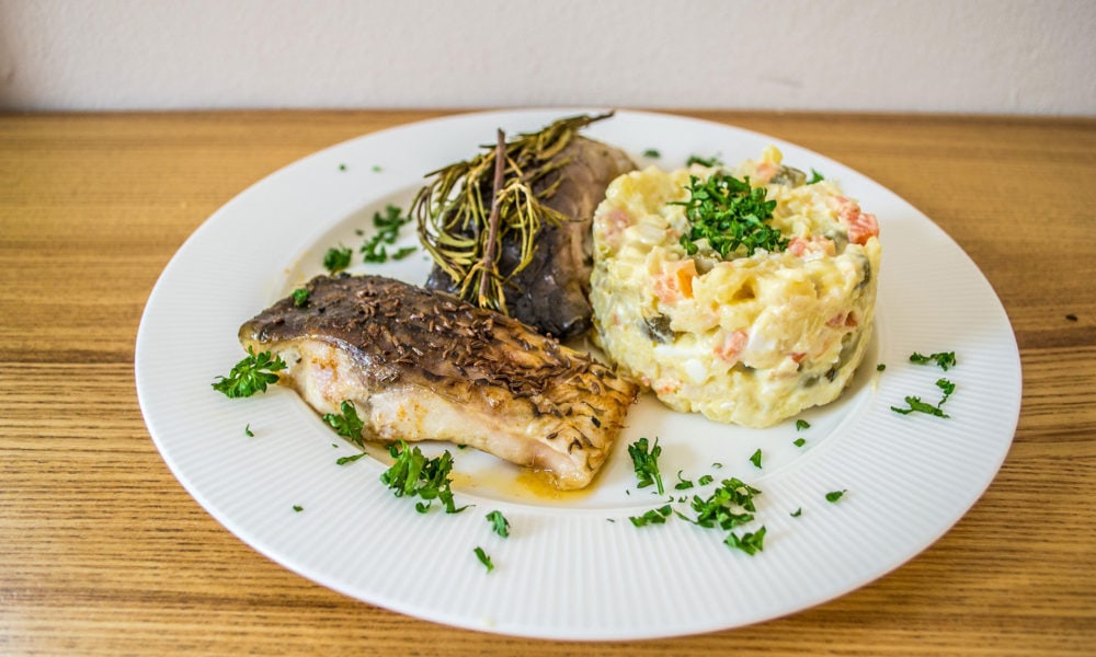 Traditional Christmas carp at Christmas Restaurant in Prague